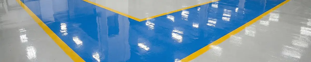 A factory floor professionally covered and marked with epoxy flooring in New Haven, CT