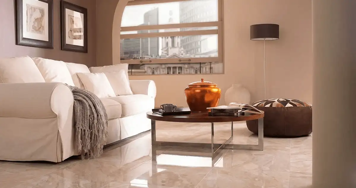 Modern living room with professionally installed marble flooring, a beige sofa, coffee table in New Haven, CT