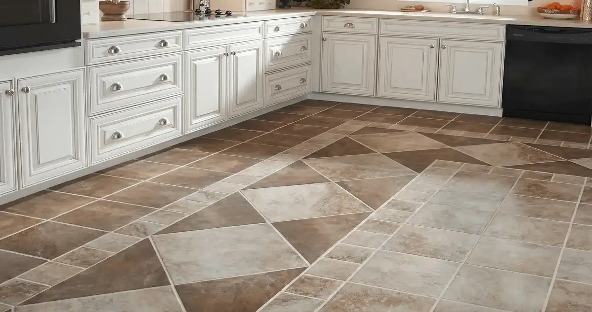 Kitchen with white cabinets and a professionally installed tile floor in New Haven, CT